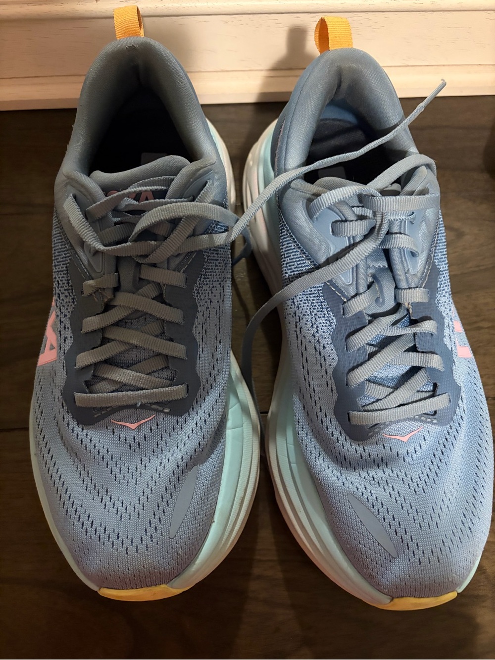 Hoka Women's Light Blue Running Shoes with Pink & Yellow Accents